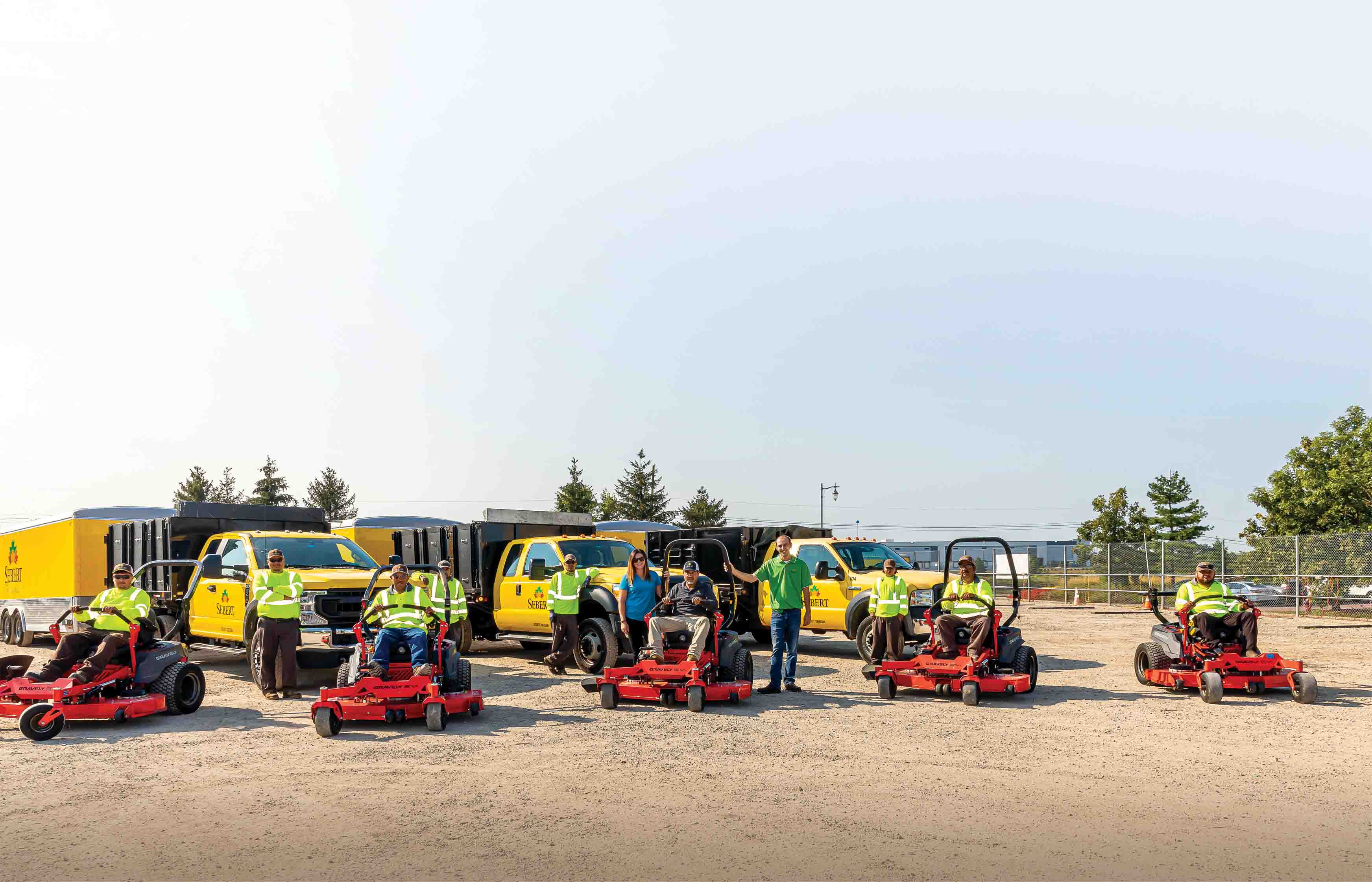 The team at Sebert Landscape proudly shows off its new fleet of Gravely PRO-TURN EVs.