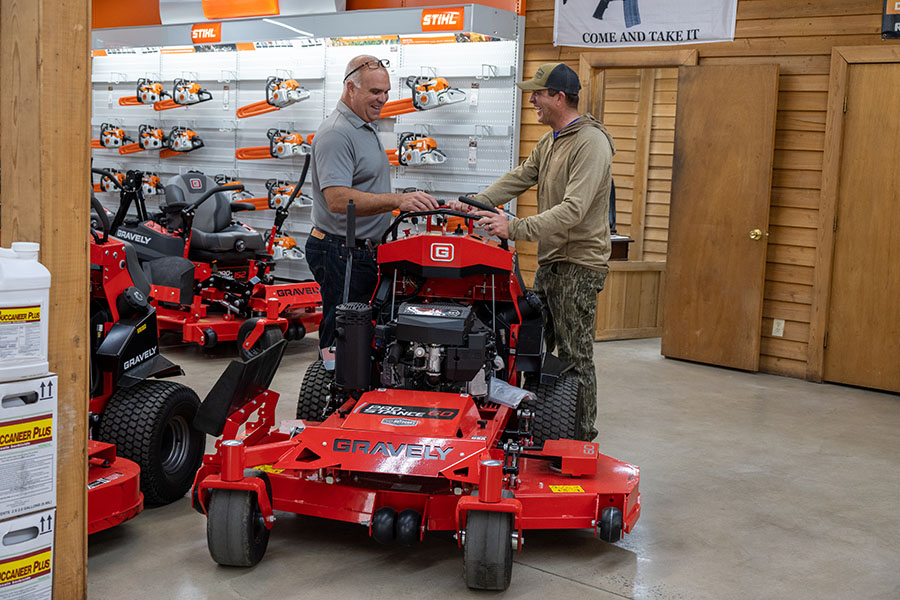 Wesley Yawn shows a customer a Gravely Pro-Stance 60.